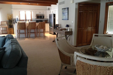Beach style living room photo in Other
