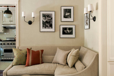Example of a mid-sized eclectic open concept dark wood floor living room design in New York with beige walls and no tv