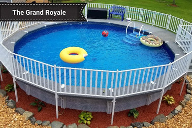 Pool - mid-sized traditional backyard round aboveground pool idea in DC Metro