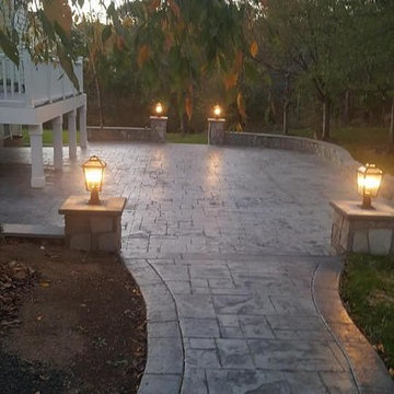 T-Stamped concrete patio, flagstone wall with columns