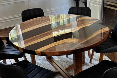 Example of a mid-sized trendy dining room design in New York