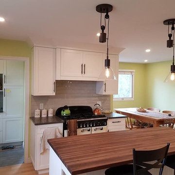 Charming bright white kitchen with adjoining bathroom