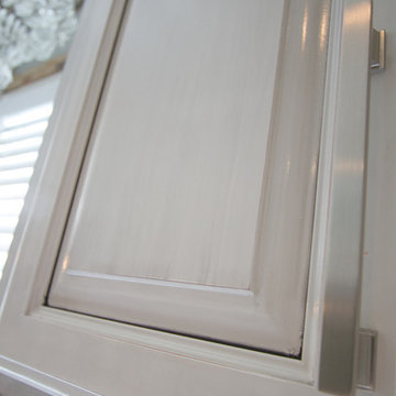 Gray painted kitchen cabinets