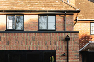 Design ideas for a contemporary house exterior in Hertfordshire.
