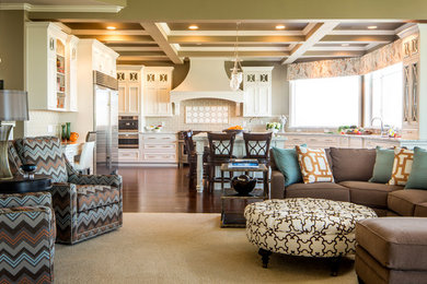 Photo of an expansive traditional formal open concept living room in Seattle with dark hardwood floors and beige walls.