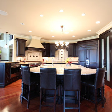 Dark Stained Maple Raised Panel Cabinets in Beige Kitchen