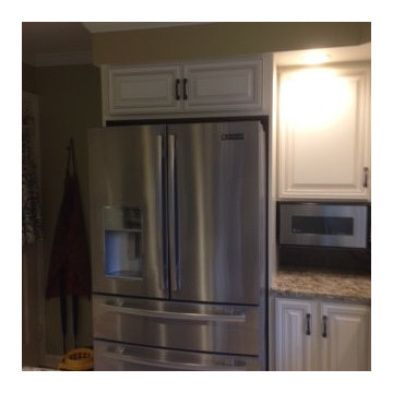 cabinet refacing with granite and custom backsplash