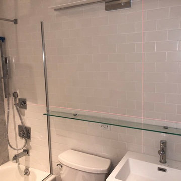 Splash guard, mirror and glass shelve.