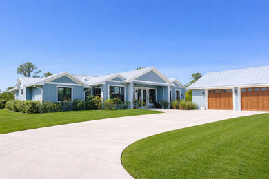 Inspiration for a cottage exterior home remodel in Miami