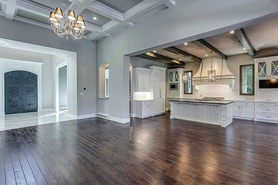 Large minimalist eat-in kitchen photo in Dallas with an island