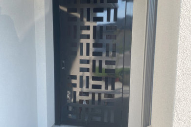 Inspiration for a mid-sized modern entryway remodel in Boise