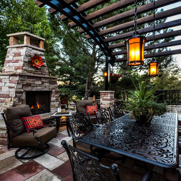 Backyard Patio with Fireplace and Pergola