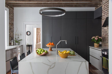Inspiration for a mid-sized transitional brown floor eat-in kitchen remodel in Charleston with gray cabinets and marble countertops