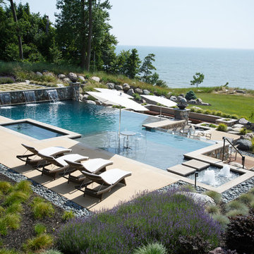 Modern pool, spa and landscape on lakeshore