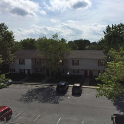 Old 3-Tab Shingle Removal on Entire Apartment Complex - Roofing And Gutters