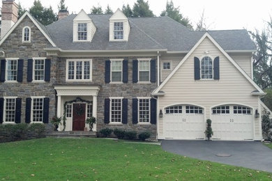 Huge traditional multicolored three-story mixed siding house exterior idea in Philadelphia with a hip roof and a shingle roof