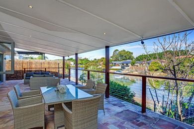 This is an example of a tropical patio in Gold Coast - Tweed.