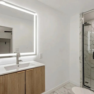 Floating Vanity and Walk-In Shower
