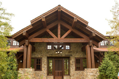 Example of a mountain style exterior home design in Portland