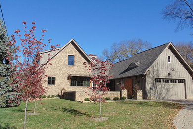 Craftsman beige two-story concrete fiberboard exterior home idea in Columbus with a shed roof