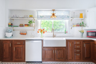 Mid-sized eclectic u-shaped ceramic tile and white floor kitchen photo in Little Rock with a farmhouse sink, quartz countertops, white backsplash, ceramic backsplash, white appliances, an island and white countertops