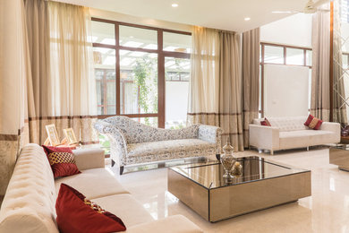 Living room - contemporary living room idea in Bengaluru