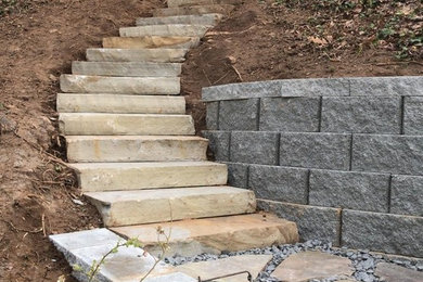 Photo of a mid-sized side yard gravel retaining wall landscape in Atlanta for spring.