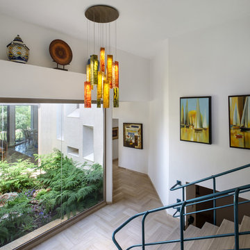 Transitional Home using Tanzania and Autumn Leaves Fixtures