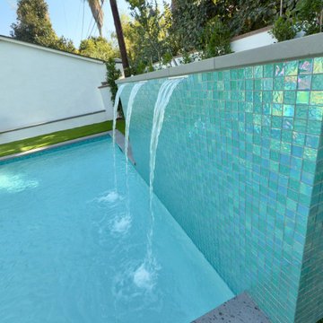 Morisson pool and spa raised wall with sheer decent