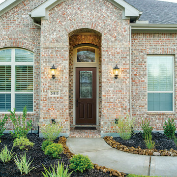 Aurora Brown 8 Foot Half-Lite 2-Panel Salinas Wrought Iron Glass