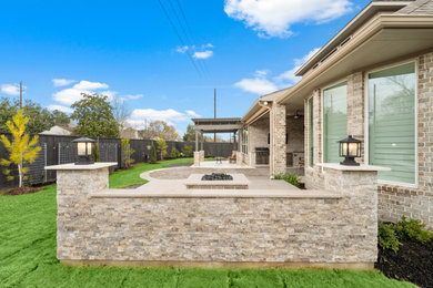 Patio - traditional patio idea in Houston