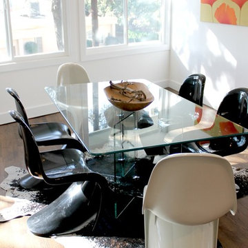 Panton S Chairs, Glass Dining Table, Cowhide Rug