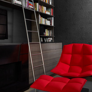 Design ideas for a medium sized modern study in Toronto with black walls, carpet and a built-in desk.