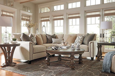 Inspiration for a mid-sized coastal open concept light wood floor living room remodel in Wilmington with white walls, no fireplace and no tv