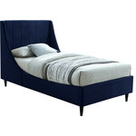 Meridian Furniture - Eva Velvet Upholstered Bed, Navy, Twin - Snuggle up to a pet or other loved one in this richly upholstered Eva navy velvet twin size bed for the ultimate in rest and relaxation. The wing back headboard has cushioned vertical deep channel tufting, and both the side rails and footboard are upholstered too for your comfort. Tapered black wood legs match the upholstery and support this contemporary bed, elevating it sufficiently that you can store items underneath.