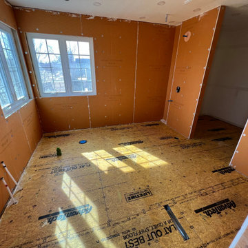 Floor primed for Ditra heat membrane