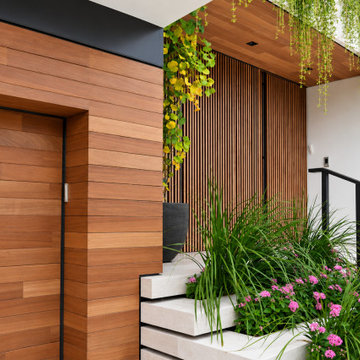 Architectural Wood Cladding | Modern Luxury Entrance – Golden Beach