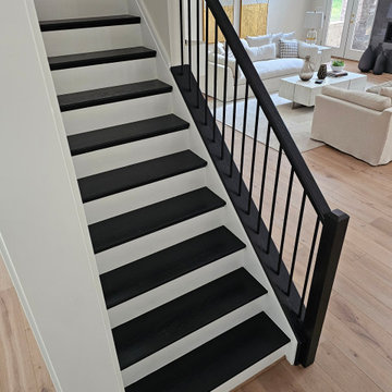 Project #130 | Curved Staircase with Wraparound Balcony