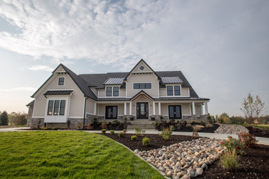 Inspiration for a craftsman white two-story wood exterior home remodel in Chicago with a mixed material roof