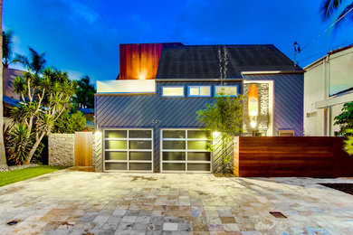 Beach style two-story exterior home photo in San Diego