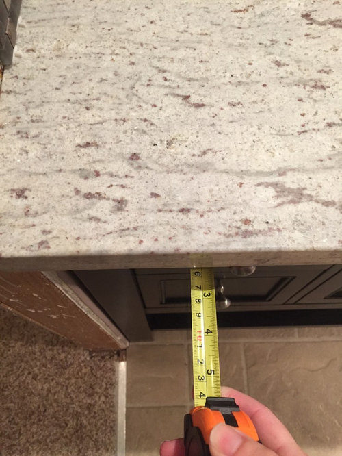 Granite countertops installed with too much overhang