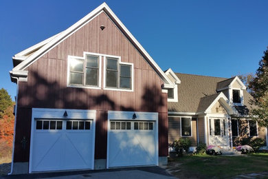 Example of a mid-sized transitional red two-story mixed siding exterior home design in Boston