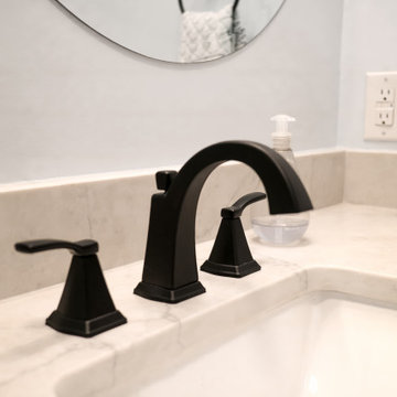 Matte Black Widespread Faucet on Quartz Vanity