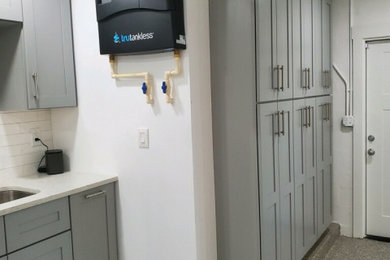 Example of a trendy garage design in Tampa