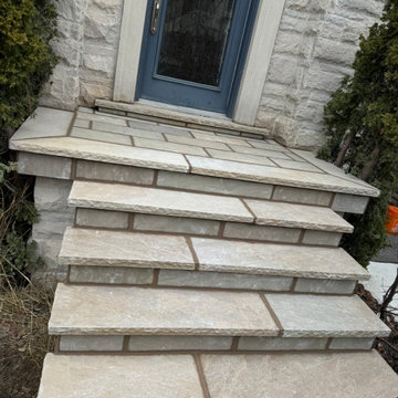 Replacement Of Old Impaired Stone To New Masonry Stone Porch & Step Cladding