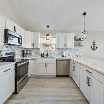 Coastal Home featuring "Castaway Oak" CALI Vinyl flooring.