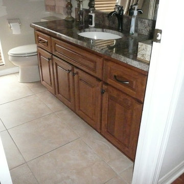 Bathroom Remodeling Done In A Cherry Raised Panel Door