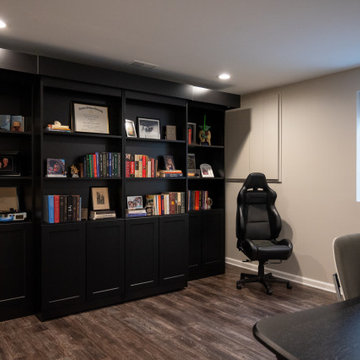 Finished Basement with Irish Themed Bar, Gym, Bathroom and Gamer Area in Canton,