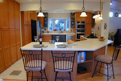 Inspiration for a mid-sized timeless u-shaped porcelain tile and beige floor open concept kitchen remodel in Other with an undermount sink, recessed-panel cabinets, light wood cabinets, quartz countertops, beige backsplash, porcelain backsplash, stainless steel appliances and an island