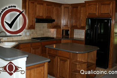 Example of a classic kitchen design in Dallas with beige backsplash, ceramic backsplash and an island